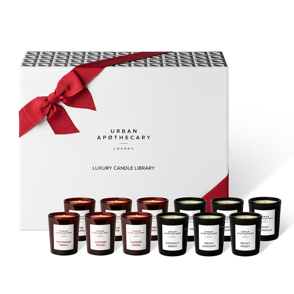 Set of candles from Urban Apothecary London with a decorative box featuring a red ribbon.