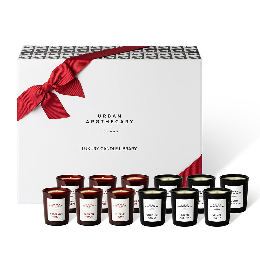 Set of candles from Urban Apothecary London with a decorative box featuring a red ribbon.